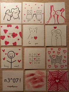 some drawings on paper with hearts and animals