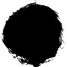 a black circle with some paint splatters on it