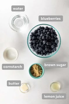 ingredients for blueberry smoothie on a white table