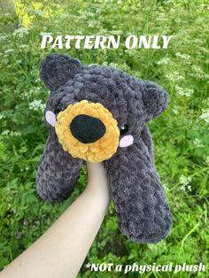 a hand holding a crocheted stuffed animal with the words pattern only on it