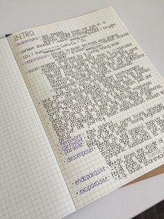 an open notebook with writing on it