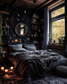 a bedroom with black walls and dark bedding