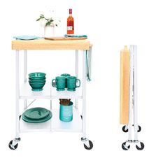 a kitchen cart with plates and cups on it