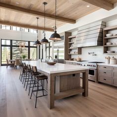 a large kitchen with an island and lots of counter space