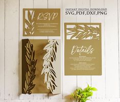 the wedding stationery was designed with gold and white paper as well as greenery