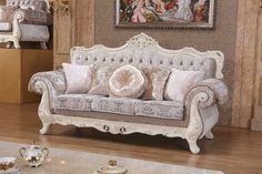 an ornately decorated couch in a living room