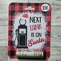 a sticker that says next tank is on santa with an image of a gas pump