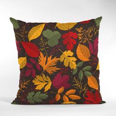 a pillow with colorful leaves on it