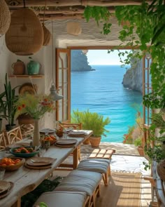 an outdoor dining area overlooking the ocean