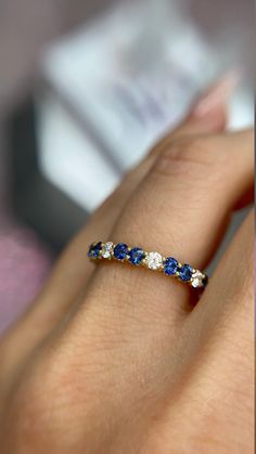 DETAILS: * Handmade item * Gemstone: Sapphire, Natural Diamond * Gem color: Blue * Band color: Yellow Gold (may vary on gold selection) * Condition: Never been Used; Made to order, Recycled Metal, Conflict-free 100% DESCRIPTION: 💎 Welcome to the Our Shop, Congratulations🍾 on discovering us. 💎 You'll be amazed at the beauty and delicate craftsmanship of this ring. This custom 18-karat gold stacking eternity ring features alternating 2 round blue sapphire sit side-by-side with one white diamond Sapphire Colors Stones, Dazzling Yellow Gold Sapphire Ring, Multi-stone Sapphire Diamond Ring With Round Cut, Round Cut Multi-stone Sapphire Diamond Ring, Yellow Gold Multi-stone Sapphire Promise Ring, Yellow Gold Diamond Ring With Tanzanite In Prong Setting, Anniversary Sapphire Diamond Ring With Multi-stones, Sapphire Multi-stone Diamond Ring In Cubic Zirconia, Promise Multi-stone Sapphire Ring In Yellow Gold