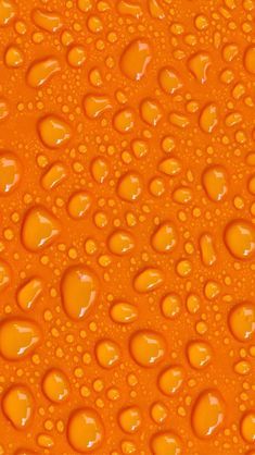 water drops on an orange surface