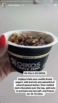 someone is holding up an ice cream cup with nuts in it and the caption reads, vanilla milk yogurt or this is so good