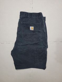 Carhartt Carpenter Pants altered to shorts. check picture for measurements Size: 36 inch Length: 19 inch Leg Opening: 11 inch Carhartt Pants Women's, Carhartt Shorts, Carhartt Carpenter Pants, Carhartt Carpenter, Carhartt Pants, Carpenter Pants, Gender Neutral, Adult Outfits, Trousers