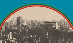 an old photo of a rainbow in the sky over a city with tall buildings and skyscrapers