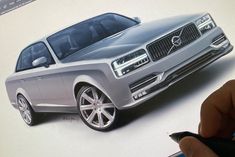 a drawing of a volvo car on paper