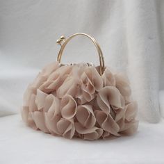 Handbags Type: TotesTypes of bags: Top-Handle BagsMain Material: PolyesterShape: FrameExterior: NONEGender: WOMENStyle: FashionClosure Type: HaspInterior: Interior Slot PocketHardness: SOFTPattern Type: SolidLining Material: PolyesterDecoration: FlowersDecoration: SequinedDecoration: DiamondsOccasion: VersatileItem Type: HandbagsColor: ChampagneMaterial: PolyesterOccasion: Wedding,Party,Casual,Formal Fancy Purses, Floral Clutches, Bridal Bag, Wedding Purse, Wedding Clutch, Girly Bags, Bridal Clutch, Flower Bag, Fancy Bags