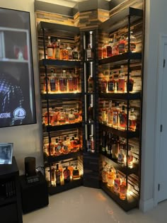 a room with shelves filled with bottles and jars