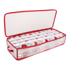 a red and white case filled with lots of cupcakes