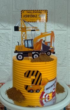 a construction themed birthday cake on a table