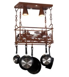 two pots and pans hanging from a metal rack