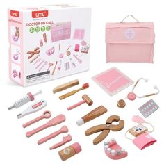 a pink doctor's kit with tools and accessories