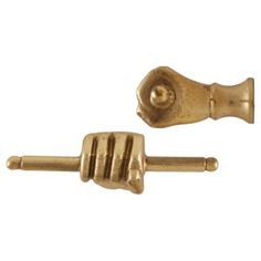 two gold colored metal knobs on white background