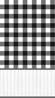 a black and white checkered table cloth with wood planks in the background,