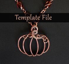 a necklace with a pumpkin on it and the words template file in front of it