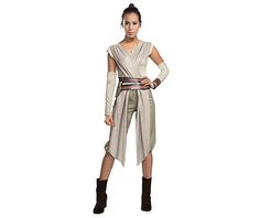 a woman dressed in star wars costume standing with her hands on her hips and looking at the camera