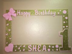 a happy birthday photo frame with pink and green decorations