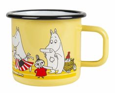 a yellow mug with cartoon characters on it