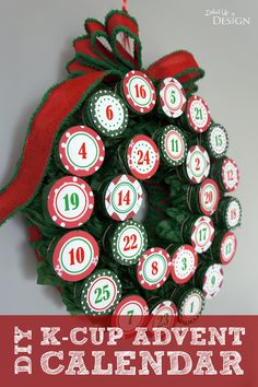 a christmas wreath made out of bottle caps with the words k - cup advent calendar on it