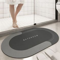 a bathroom rug with the word bathroom on it