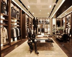 a man is sitting on a bench in the middle of a walk - in closet