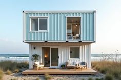 a house made out of shipping containers on the beach