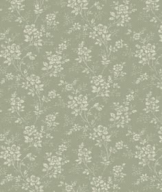 a green wallpaper with white flowers on it