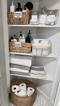 a bathroom with shelves filled with toiletries and towels