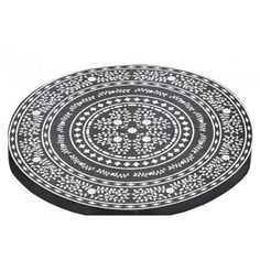 a black and white plate with an intricate design