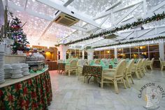 an indoor dining area decorated for christmas