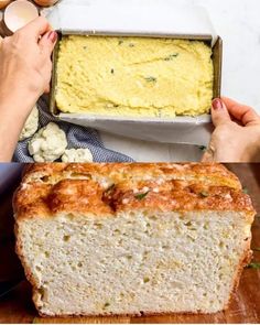 someone holding a loaf of bread over a pan of food on a wooden cutting board