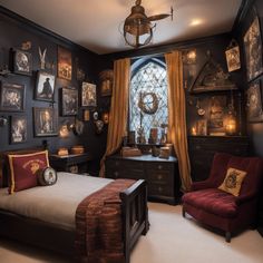 a bedroom with a bed, chair and many framed pictures on the wall above it