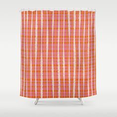 an orange and pink plaid shower curtain