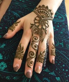 henna tattoo on the palm of a woman's hand is shown in an instagram