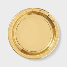 an empty gold plate on a white background