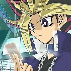 an anime character holding a cell phone in his right hand and looking at the screen