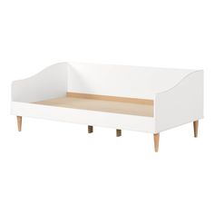 a white bed with wooden legs and an open drawer on the bottom, in front of a