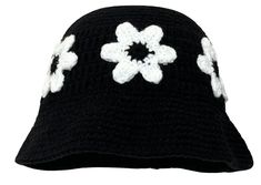 a black hat with white flowers on it