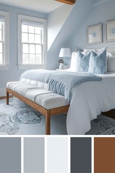 a bedroom with blue walls, white bedding and gray rugs on the floor