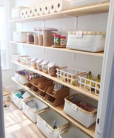 an organized pantry with baskets and food items