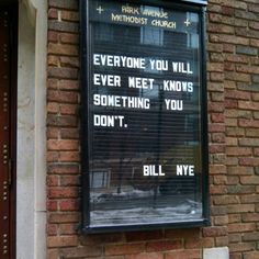 a sign on the side of a building that says everyone you will ever meet knows something you don't